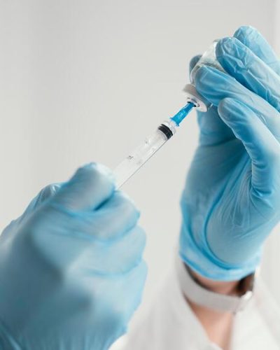doctor getting ready vaccine patient doctor getting ready vaccine patient